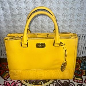 yellow Micheal kors bag with trap